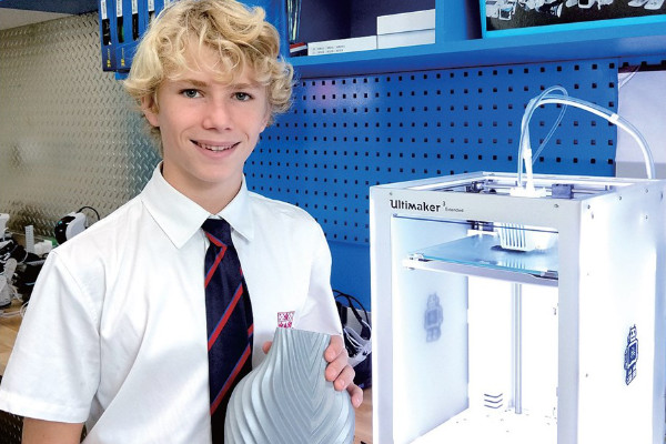 students with a 3D printer